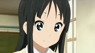 Mugi steals Mio's strawberry