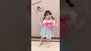 is she a human? or doll ?