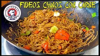 Spaghetti with meat and vegetables. Chinese food