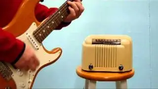 Guitar practice amp in Bendix Radio body