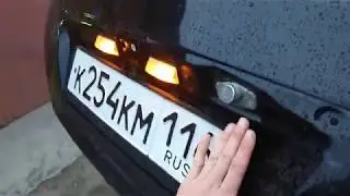 Замена лампочек подсветки номера Nissan Tiida