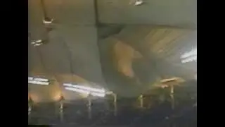 Metrodome hole in roof from thunderstorm. News coverage: 1986