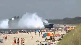Десантный корабль Зубр выплыл на пляж  Russian Navy Hovercraft Lands On Busy Beach