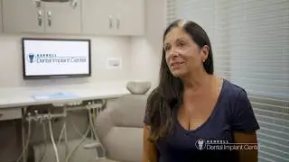 Dental implants and porcelain crowns give Maria a beautiful new smile