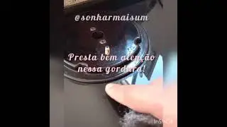 Limpando a boca do fogão com esponja de aço seca. Brilho sem arranhar