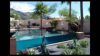 Glass wet edge pool - A very high-end swimming pool by Cimarron