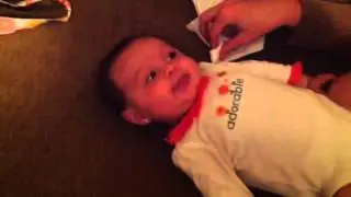 Lyla blowing raspberries