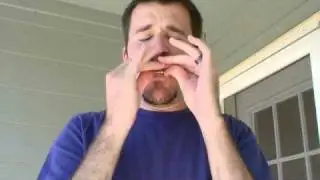 World's Smallest Harmonica - Adam Holmes