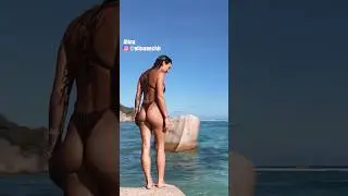 Falling off a rock on bikini beach 