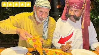 Tribal People Visit a Stone Oven Pizza Restaurant for the First Time