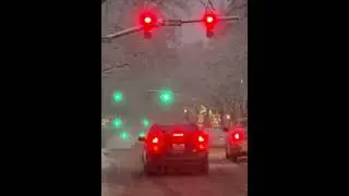 Street lights flashing in downtown Troy.