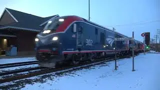 A very late Empire Builder makes the rounds through Hastings with two heritage units ALC-42 P42