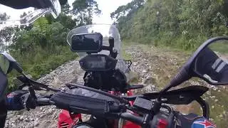 CRF 250 Rally through the mountains. She earned her first scratches :)