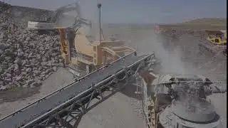 Striker mobile cone crusher processing aggregates in a quarry