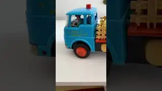 Инерционный, музыкальный, жестяной грузовик “Tomy”Ol’Macdonald’s, Япония