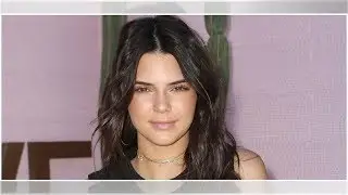 Kendall Jenner Shows Off Bare Chest Under See-Through White Shirt