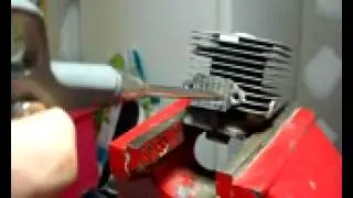 baja tapping out a head to take 6mm exhaust bolts