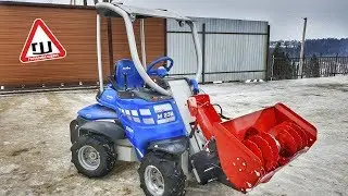 Чистим снег трактором погрузчиком  со снегоротором!