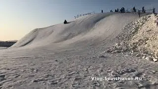На тюбе с горки