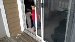 Nicco playing on the balcony