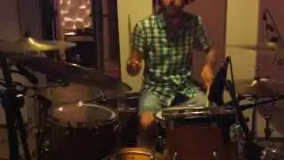 mike kapilidis in the studio-recording a track