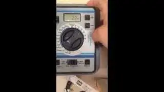 how to program rain dial sprinkler controller