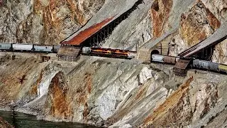 HUGE TRAINS BATTLING THE DANGEROUS RUGGED CANYON WITH BIG KCS POWER!