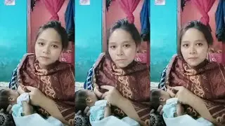 A beautiful, sweet mother breastfeeding her newborn child