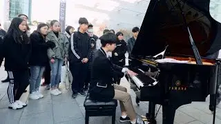 A Boy Playing Bohemian Rhapsody Medley With Street Piano