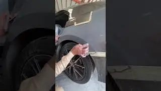 Applying gray putty on quarter nicely 
