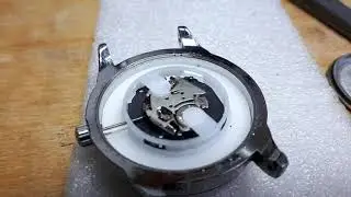 Wristwatch under a microscope. 