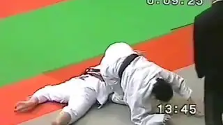 Barefooted judo girls painfull armlock