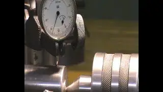 Adjusting the tailstock height. Measurement.