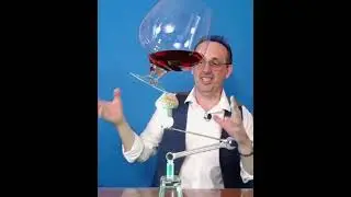 Man builds a tower with random objects (fail)