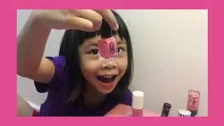 Damia with her colourful nail polish