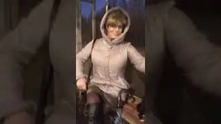 Crossdresser, transvestite. Walk in a short skirt and black tights.