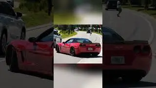Mustang vs Corvette leaving Cars and Coffee  