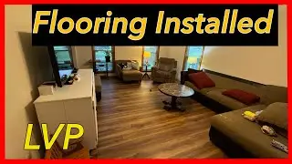 Installing LVP in living room.