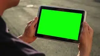 holding tablet pc with green screen   in landscape mode | chroma key | green screen capture |