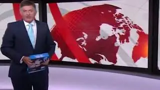BBC News Presenter Simon McCoy uses a pack of A4 paper instead of an iPad (2013)