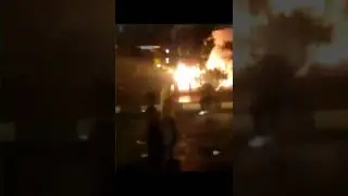 Iranian protester throws fire bomb at the anti protest police