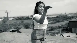 Apsara dancer Annabel Hom dancing on the rooftop at FICAC to Cambodian Space Project