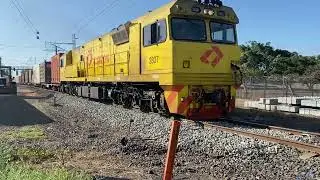 Aurizon 2837 coming past Walker Street in Bundaberg.
