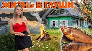 The girls caught and smoked some fish in the village! Spin fishing from a boat.