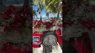 Red car , flowers. #flowers #redcar , #weddingcar , #weddingideas