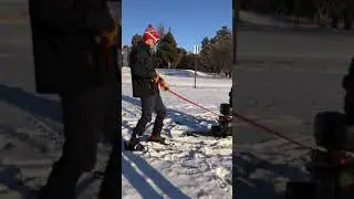Chrysler Sno-Runner pulls skier