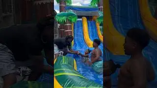 Dad throws daughters cake in water slide 😂 #shorts