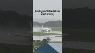 Airbus 320 A320 landing on a wet runway #aviation #aircraftlanding #Airbus