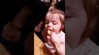 Lydia eating spaghetti .