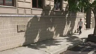 3D Szene - Mann läuft die Straße entlang